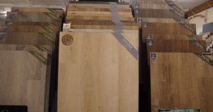 Hardwood flooring samples in a Las Vegas showroom featuring engineered wood flooring options for homeowners comparing wood floor styles and finishes.